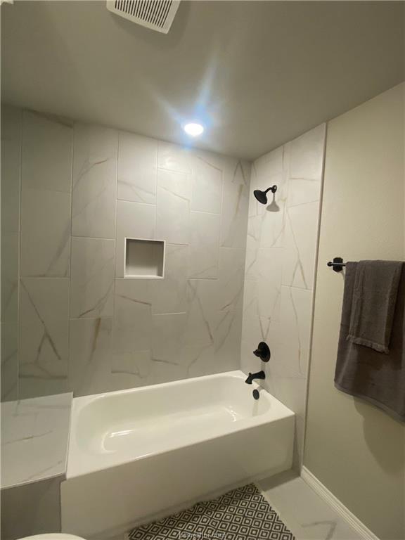 6434 Raleigh Drive College Station, TX 77845 - Photo 22 of 32 a bathroom with a tub a sink and a shower