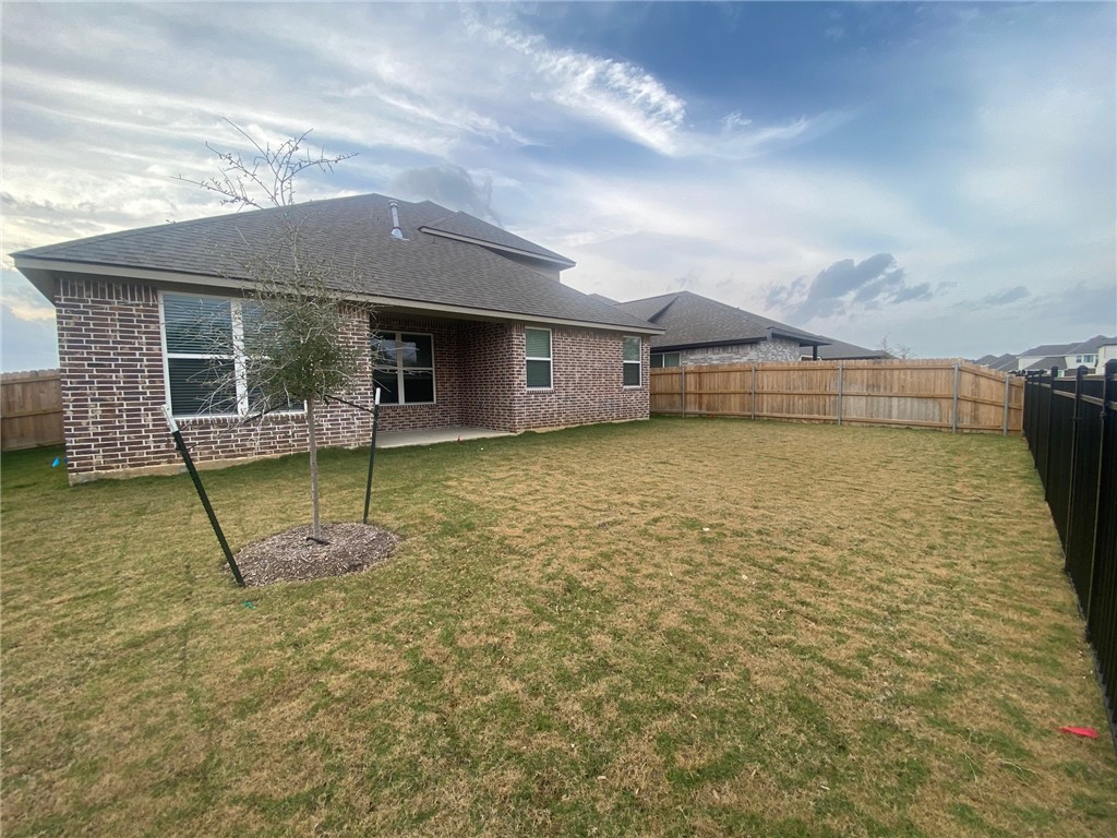 6434 Raleigh Drive College Station, TX 77845 - Photo 26 of 32 a view of a house with a backyard