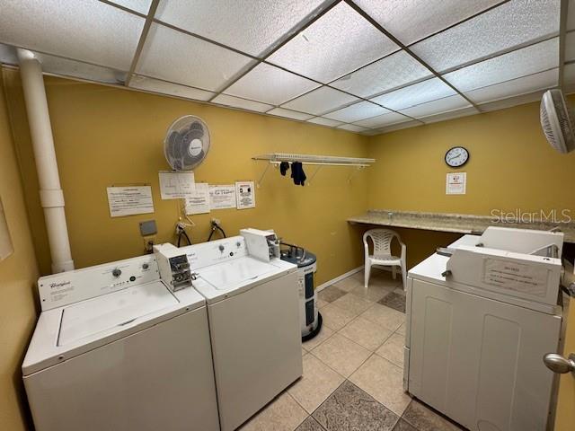 11485 Oakhurst Road, Unit 319 Largo, FL 33774 - Photo 29 of 63 a utility room with dryer and washer