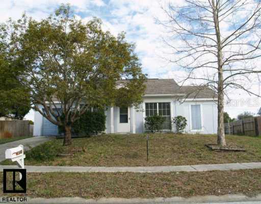 4340 County Breeze Drive New Port Richey, FL 34653 - Photo 1 of 1 a front view of a house with garden