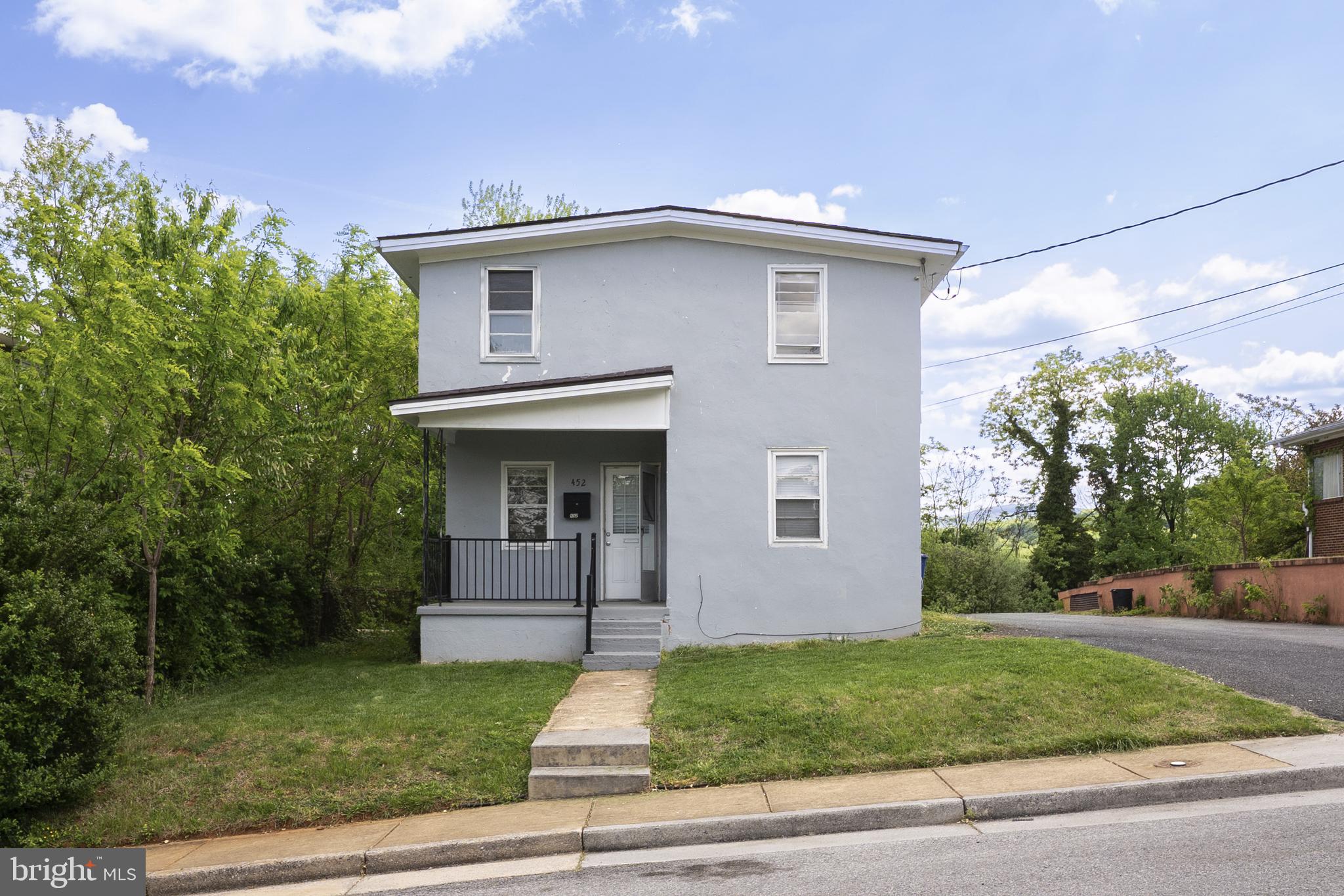 452 Acton Street Front Royal, VA 22630 - Photo 1 of 44 a front view of a house with garden