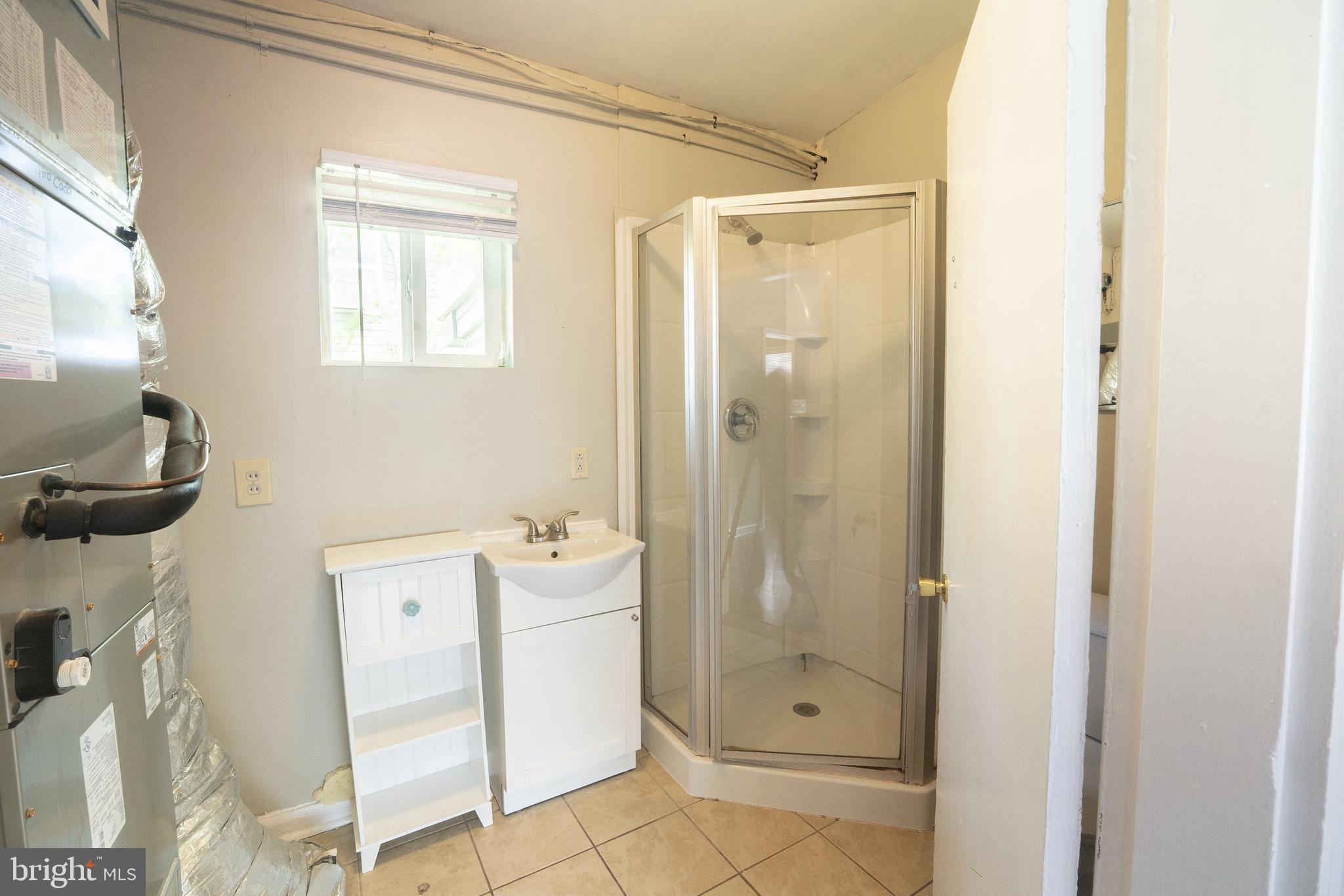 452 Acton Street Front Royal, VA 22630 - Photo 11 of 44 a bathroom with a shower