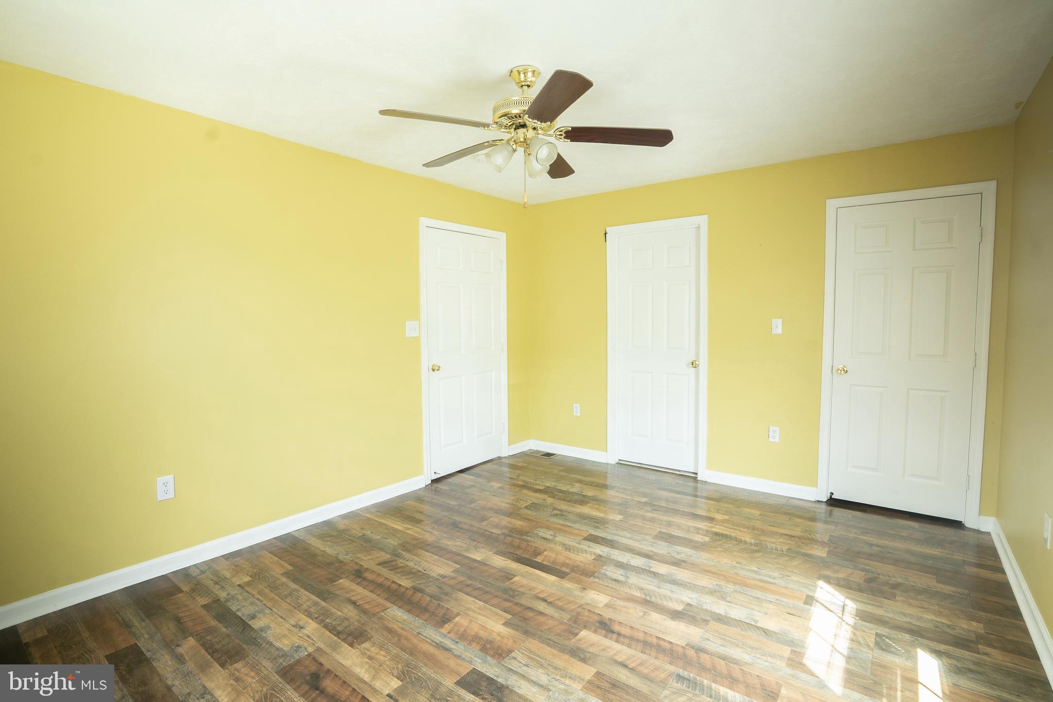 452 Acton Street Front Royal, VA 22630 - Photo 13 of 44 a view of a big room with a ceiling fan