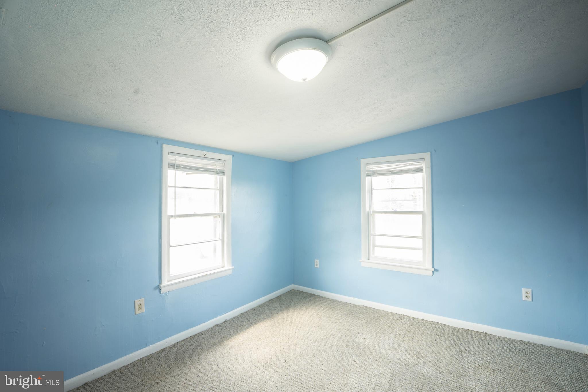 452 Acton Street Front Royal, VA 22630 - Photo 19 of 44 wooden floor in an empty room with a window