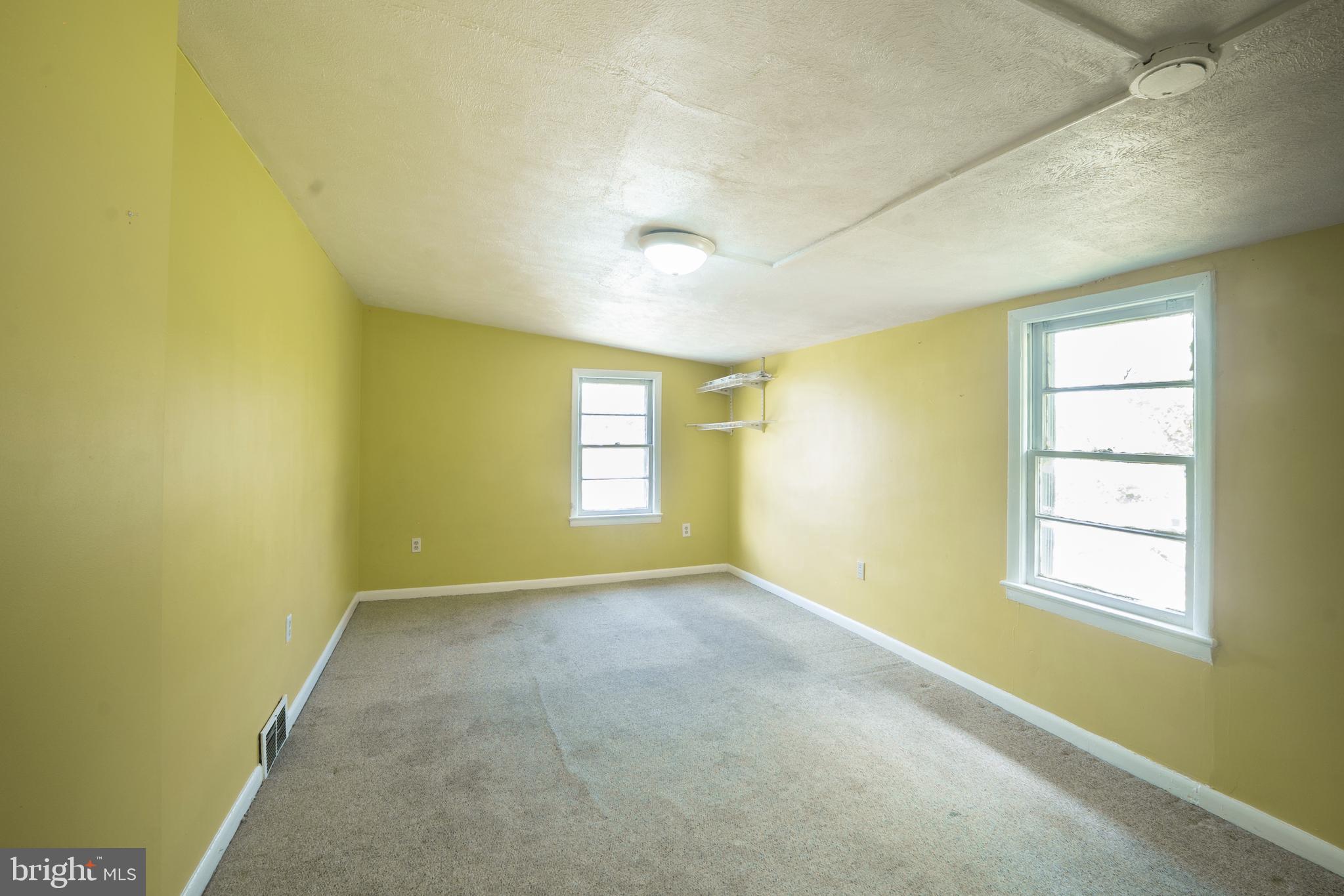 452 Acton Street Front Royal, VA 22630 - Photo 21 of 44 an empty room with windows