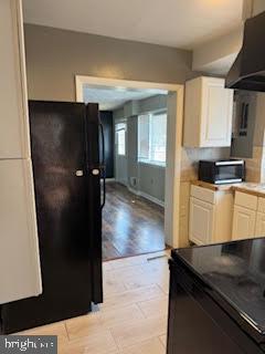 452 Acton Street Front Royal, VA 22630 - Photo 34 of 44 a kitchen with a sink and a refrigerator