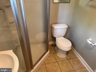 452 Acton Street Front Royal, VA 22630 - Photo 36 of 44 a white toilet sitting next to a sink