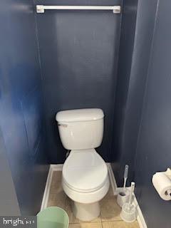452 Acton Street Front Royal, VA 22630 - Photo 42 of 44 a white toilet sitting next to a bathroom sink