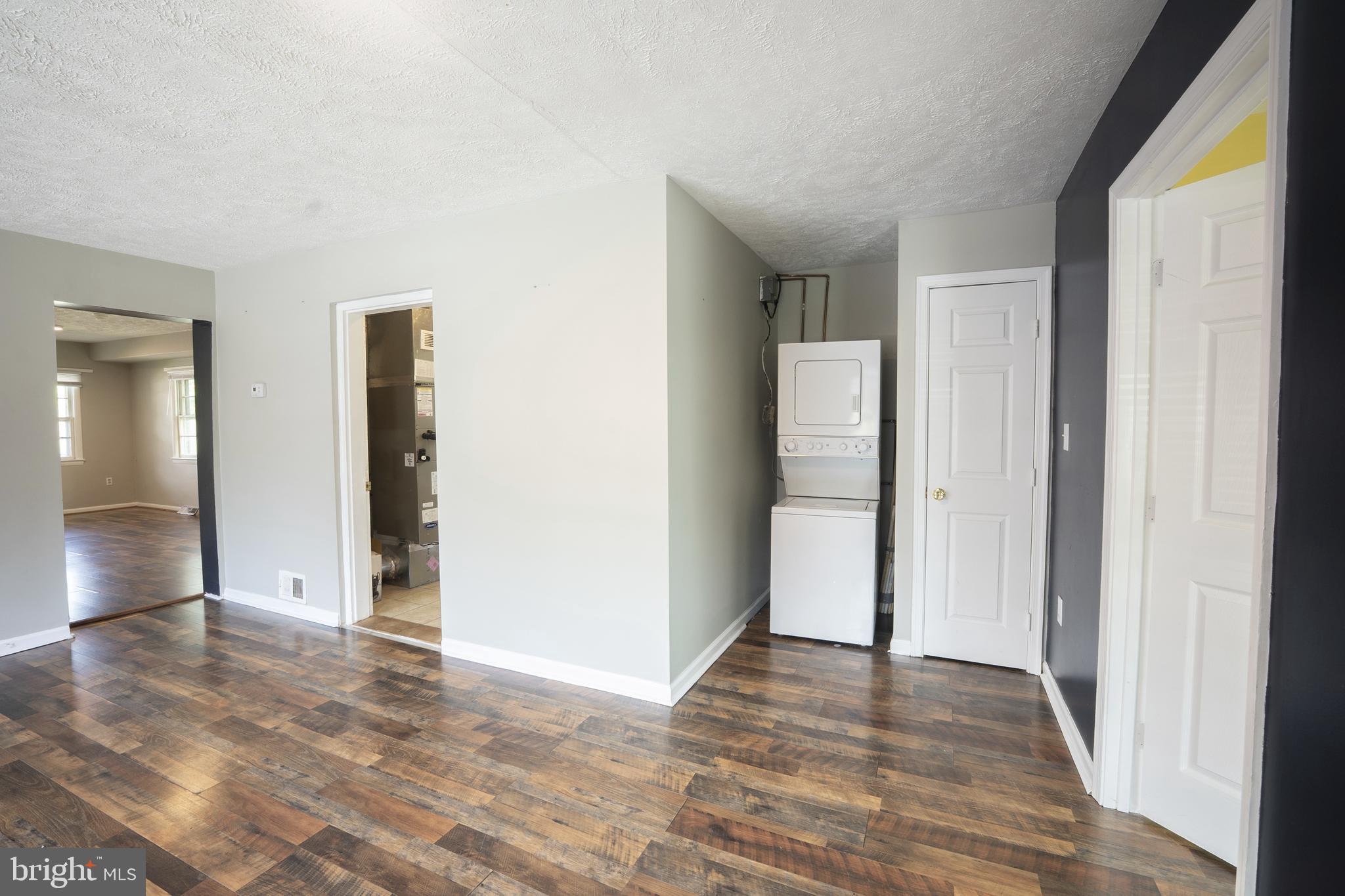 452 Acton Street Front Royal, VA 22630 - Photo 10 of 44 a view of a livingroom with wooden floor and staircase