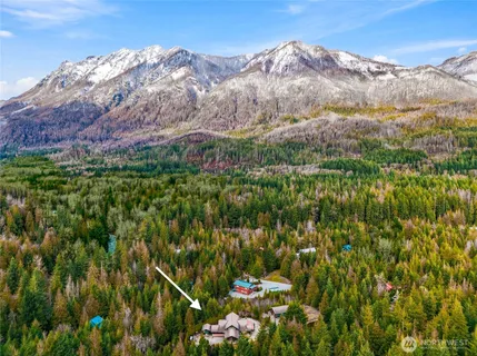 a view of a field with a mountain in the background