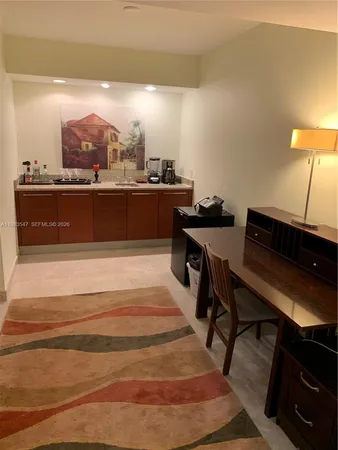 a view of a living room and dining room