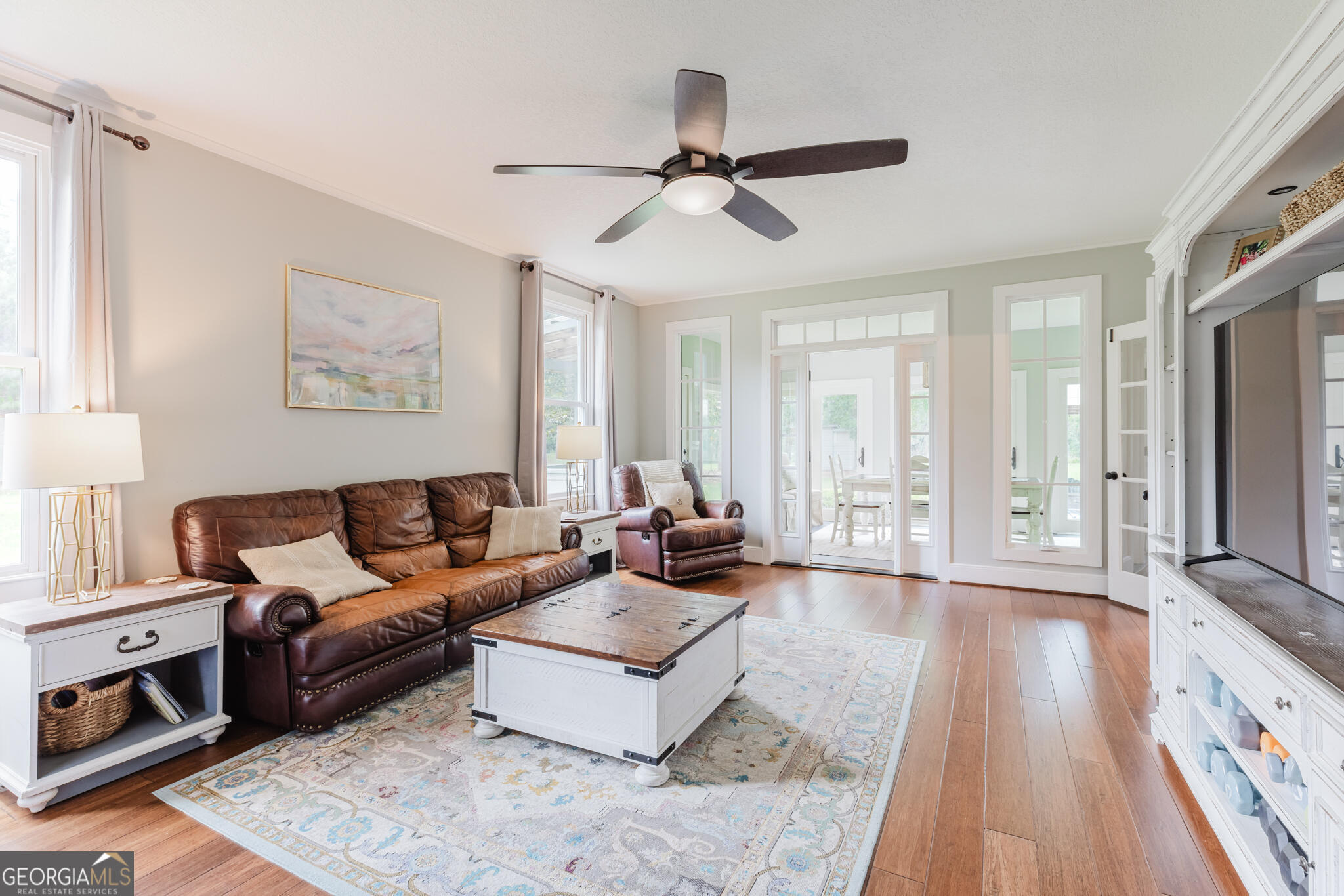 1859 Upper River Road Americus, GA 31709 - Photo 28 of 47 a living room with furniture and a flat screen tv