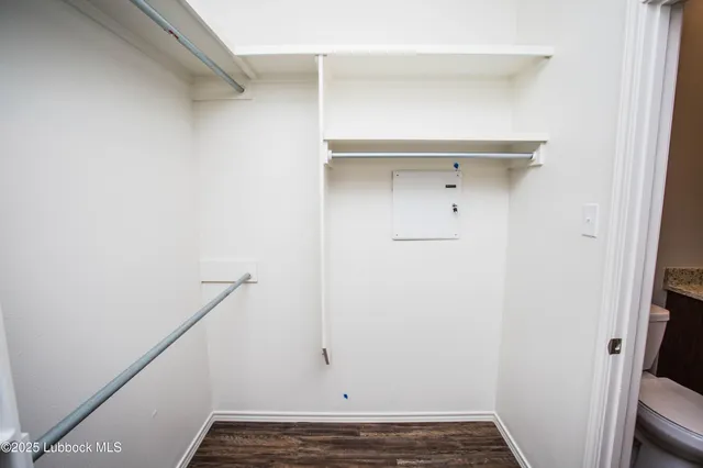 a bathroom with a shower and a sink