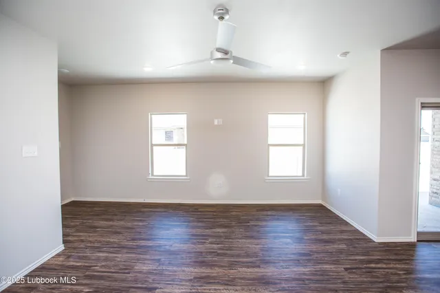 a view of kitchen and kitchen with a sink
