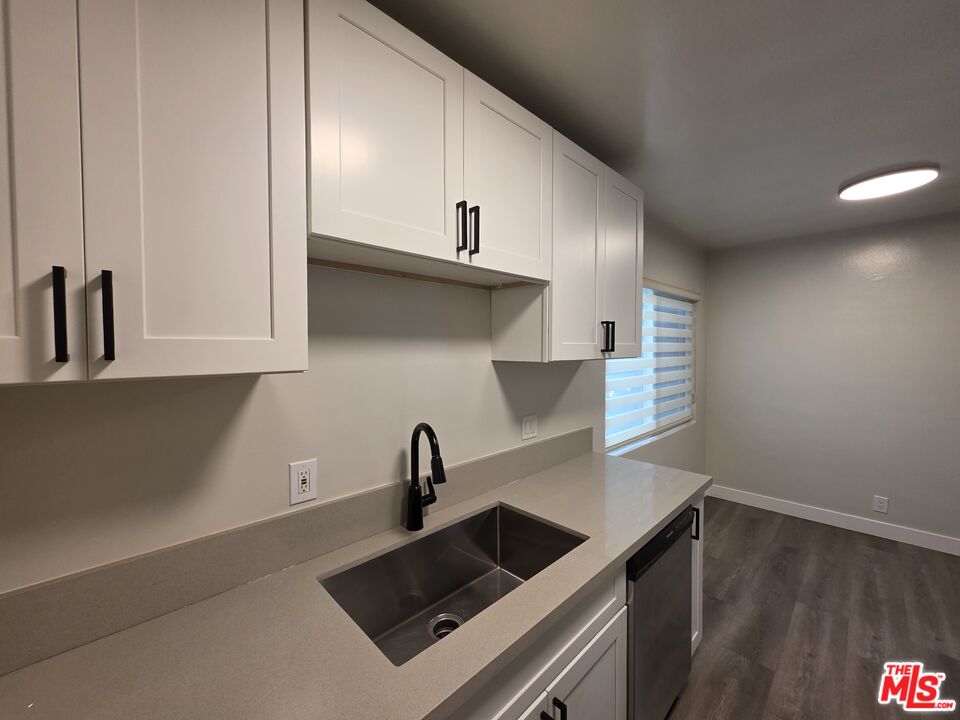1411 Innes Place, Unit 1 Venice, CA 90291 - Photo 11 of 53 a kitchen with stainless steel appliances a sink a stove and a refrigerator