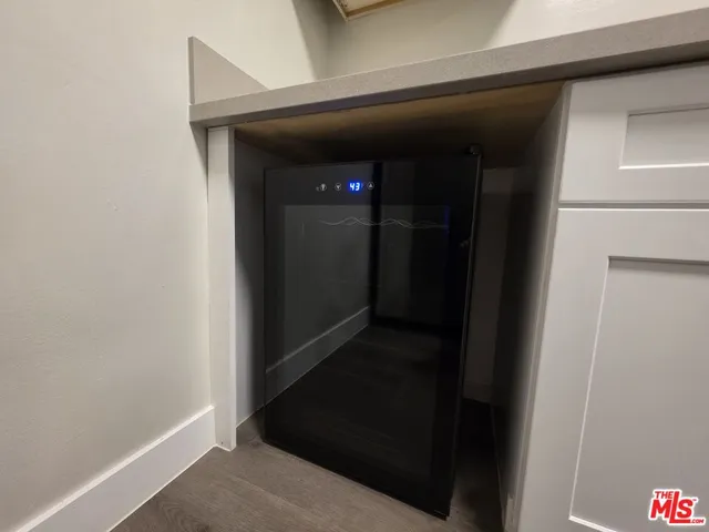 a view of hallway with wooden floor