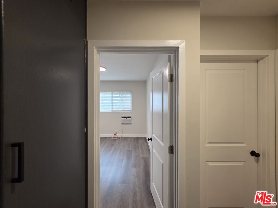1411 Innes Place, Unit 1 Venice, CA 90291 - Photo 16 of 53 a view of a hallway with wooden floor