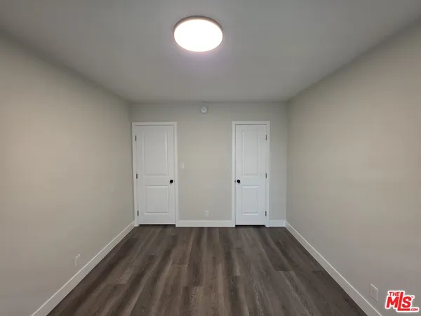 an empty room with a workbench