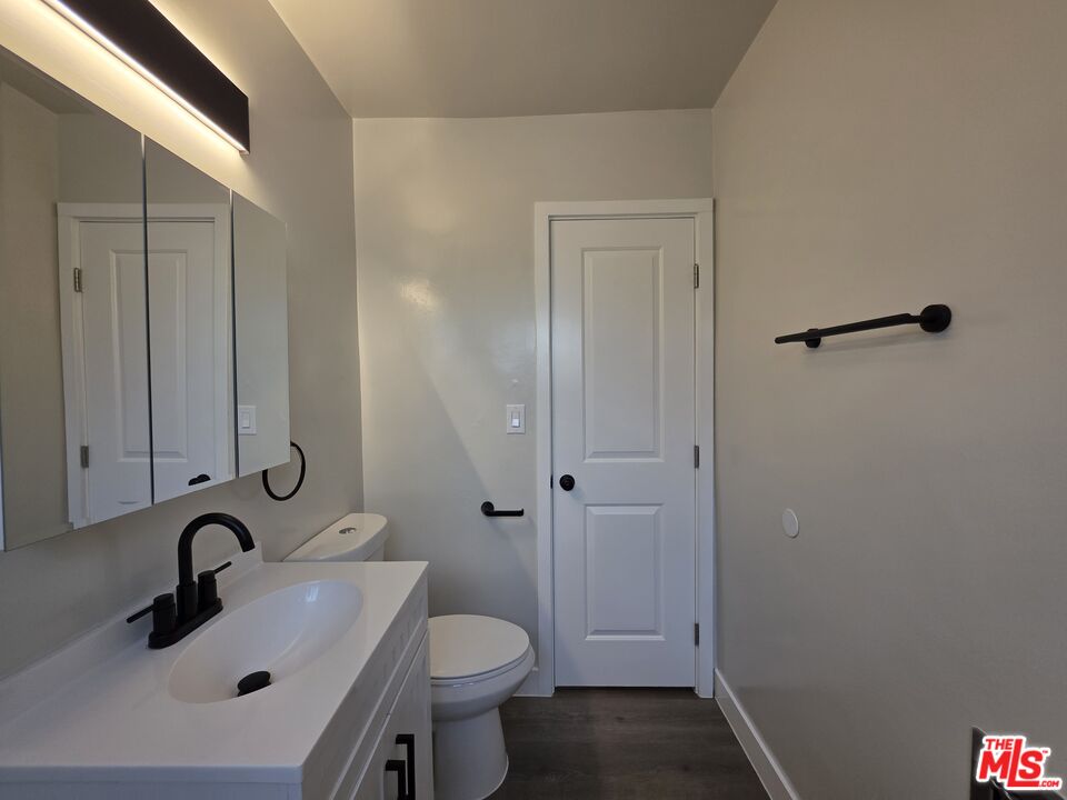 1411 Innes Place, Unit 1 Venice, CA 90291 - Photo 37 of 53 a bathroom with a sink a toilet and shower