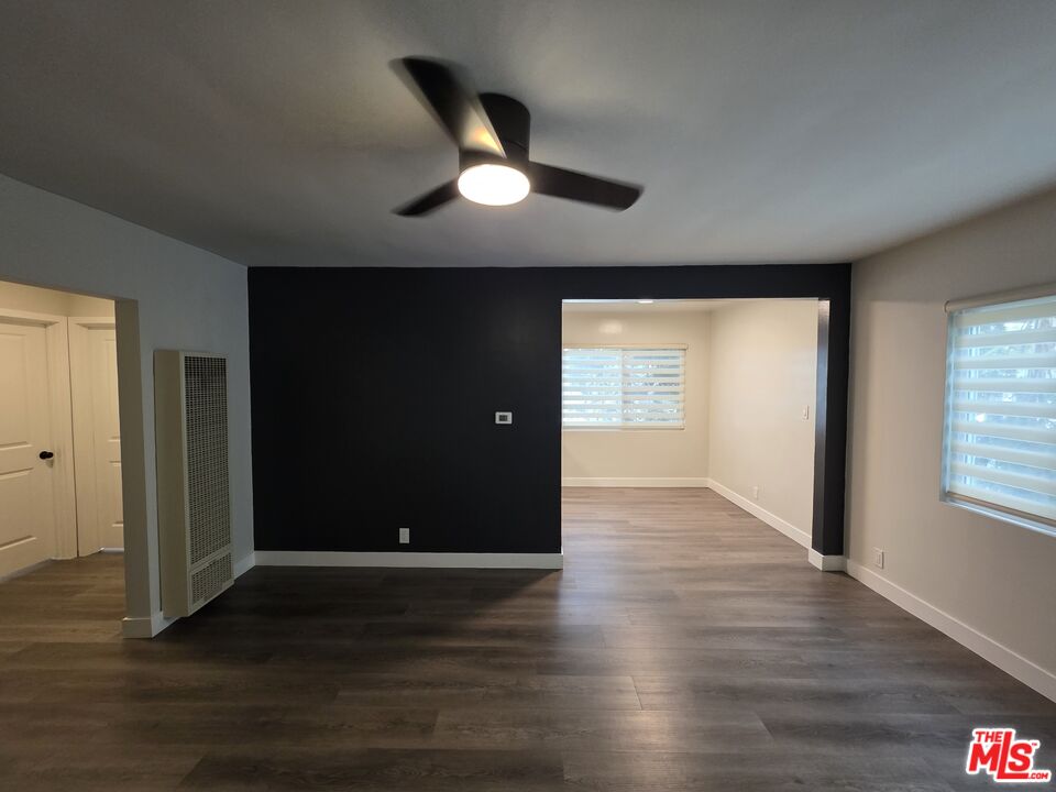 1411 Innes Place, Unit 1 Venice, CA 90291 - Photo 44 of 53 a view of an empty room with wooden floor and a window