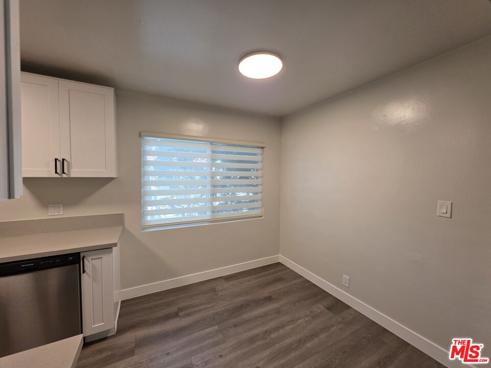 1411 Innes Place, Unit 1 Venice, CA 90291 - Photo 5 of 53 a view of an empty room with wooden floor and a window