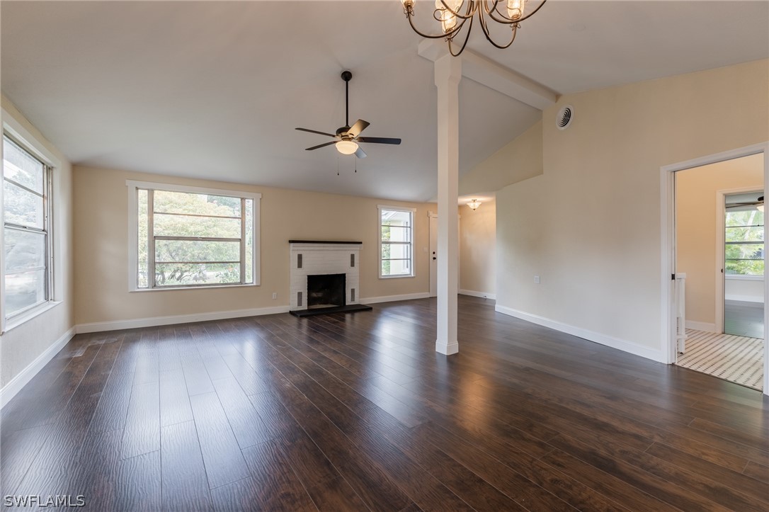 1806 Coronado Road Fort Myers, FL 33901 - Photo 7 of 23 a view of empty room with wooden floor and window