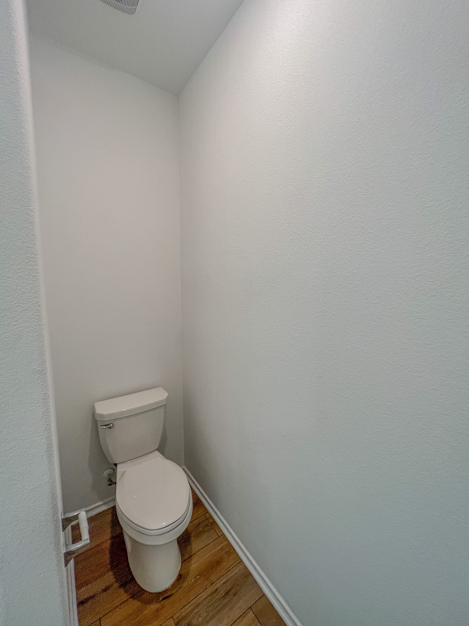 438 Perfect World Loop Jarrell, TX 76537 - Photo 12 of 35 a white toilet sitting next to a white wall