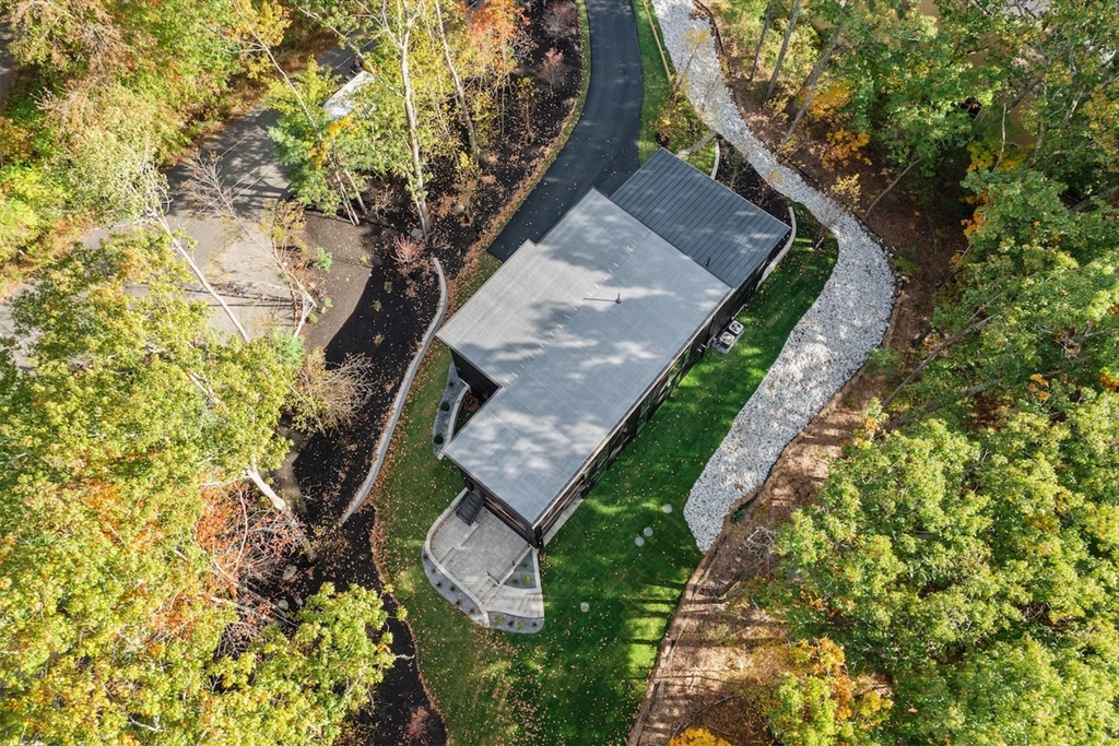 531 Annursnac Hill Road Concord, MA 01742 - Photo 24 of 27 a view of a house with a yard