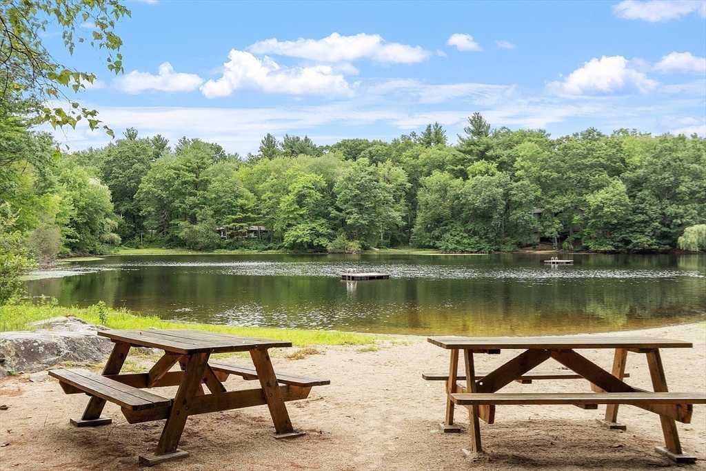 531 Annursnac Hill Road Concord, MA 01742 - Photo 26 of 27 a lake view with table and chairs