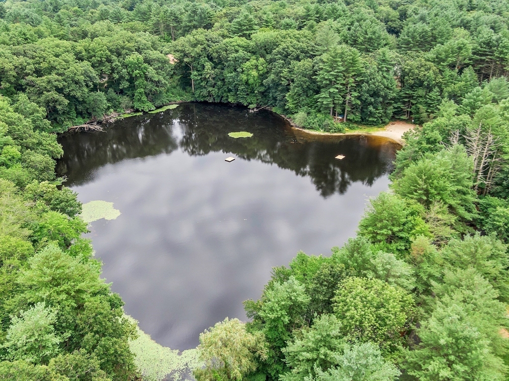 531 Annursnac Hill Road Concord, MA 01742 - Photo 27 of 27 a view of a lake with a yard