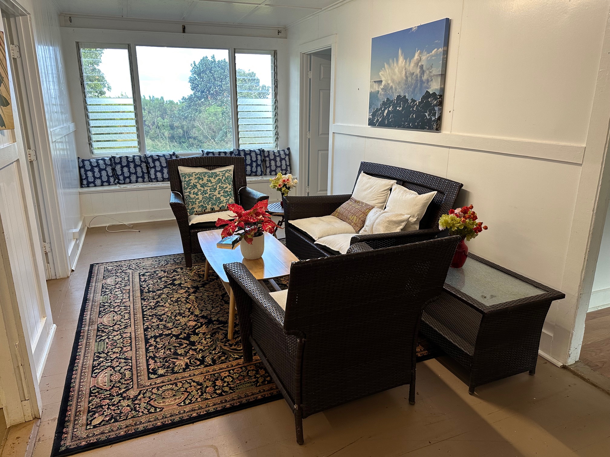 55-680 Hawi Road Hawi, HI 96719 - Photo 3 of 30 a living room with furniture and a floor to ceiling window
