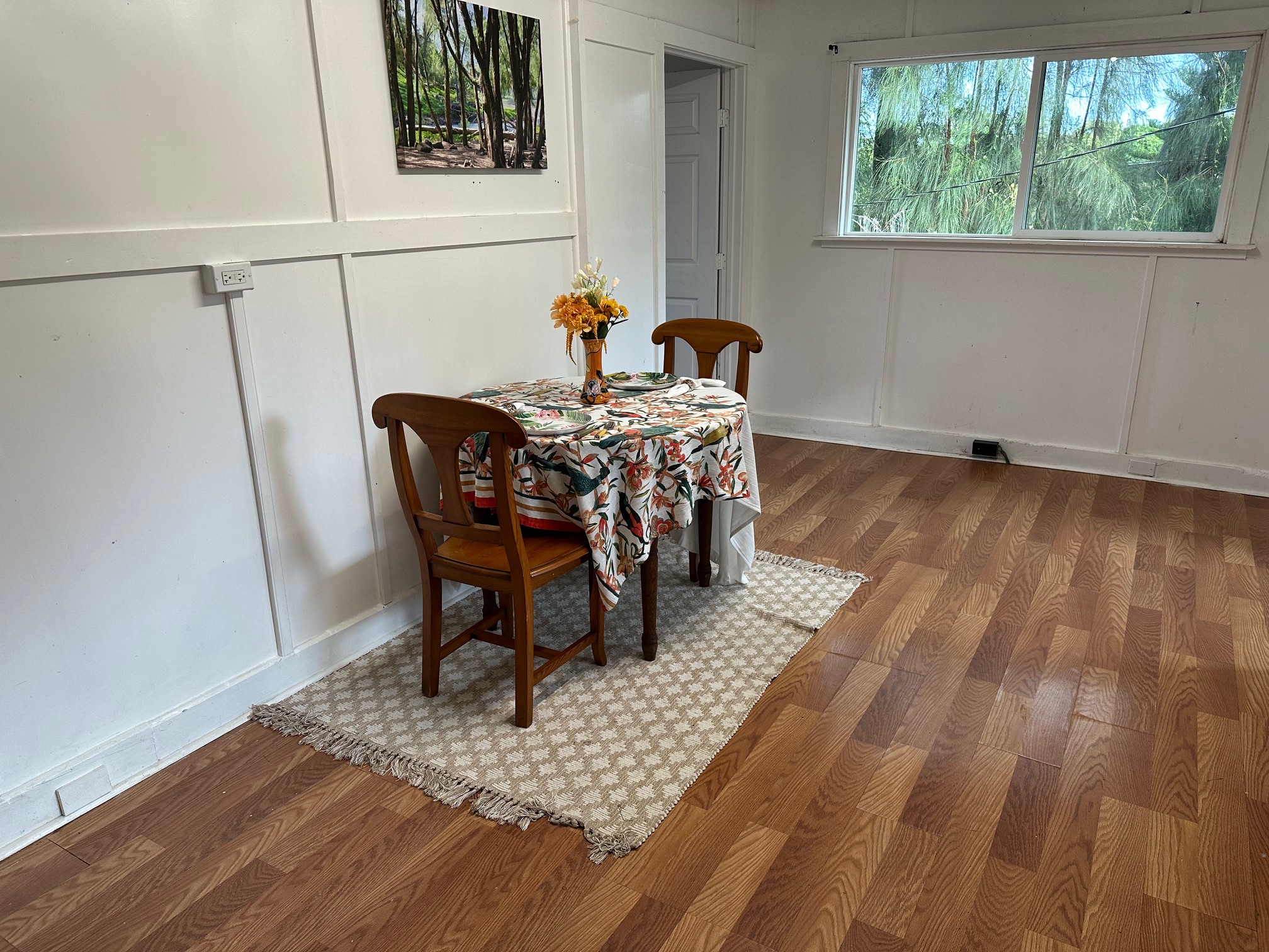 55-680 Hawi Road Hawi, HI 96719 - Photo 8 of 30 a view of a dining room with furniture and wooden floor