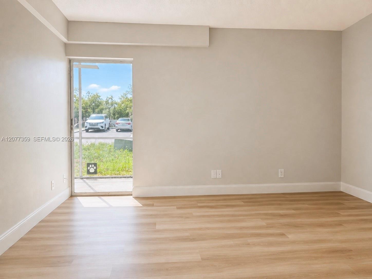 610 Northwest 13th Street, Unit 140 Boca Raton, FL 33486 - Photo 7 of 40 Bedroom with new floor and fresh paint