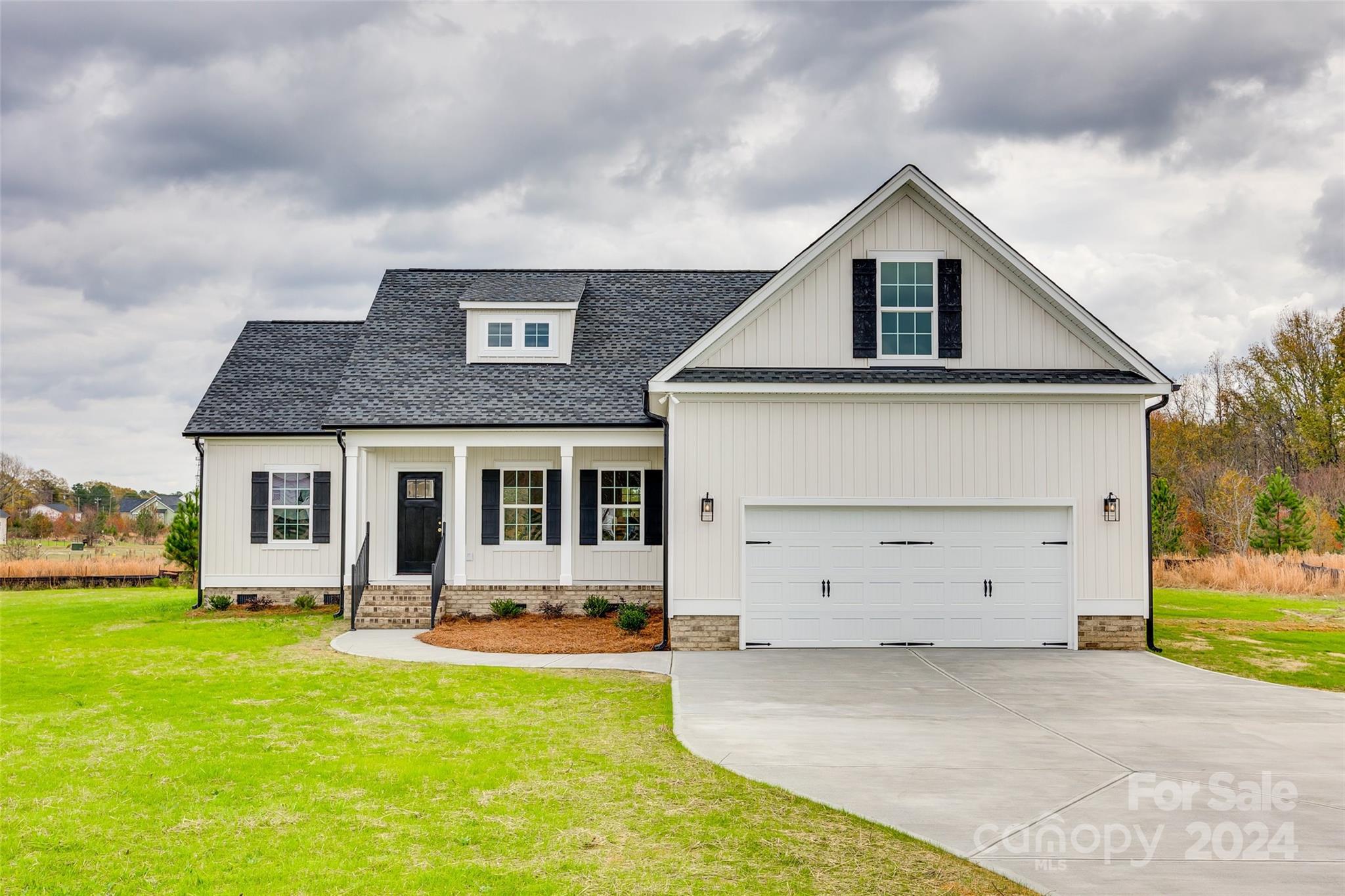 1186 Philbeck Road York, SC 29745 - Photo 1 of 35 a front view of house with yard and garage