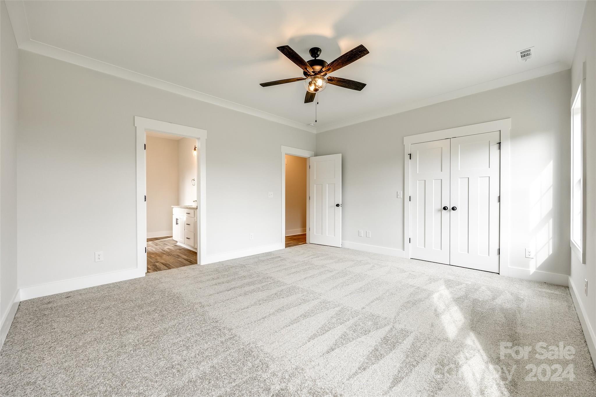 1186 Philbeck Road York, SC 29745 - Photo 24 of 35 a view of a livingroom with a ceiling fan and wooden floor
