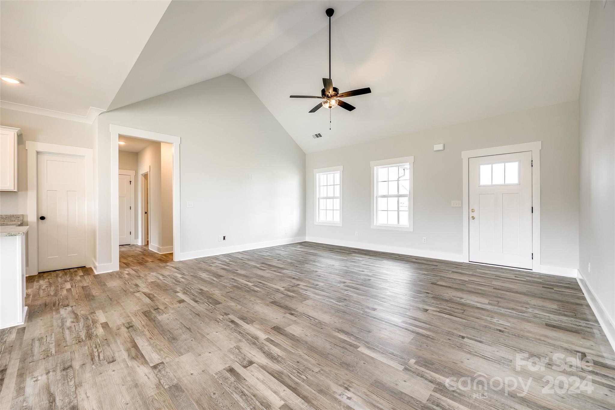 1186 Philbeck Road York, SC 29745 - Photo 5 of 35 a view of empty room with wooden floor and ceiling fan