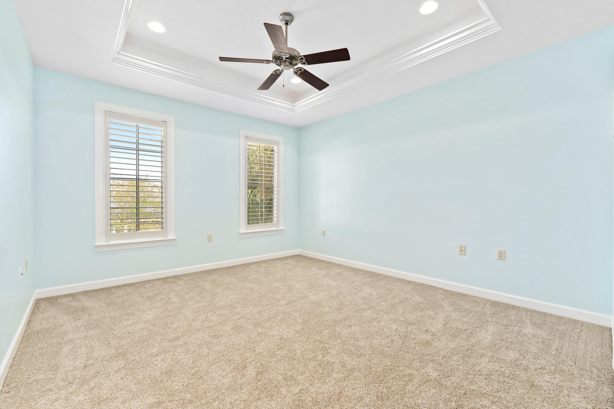 17 South Zander Way Santa Rosa Beach, FL 32459 - Photo 22 of 44 an empty room with ceiling fan and windows
