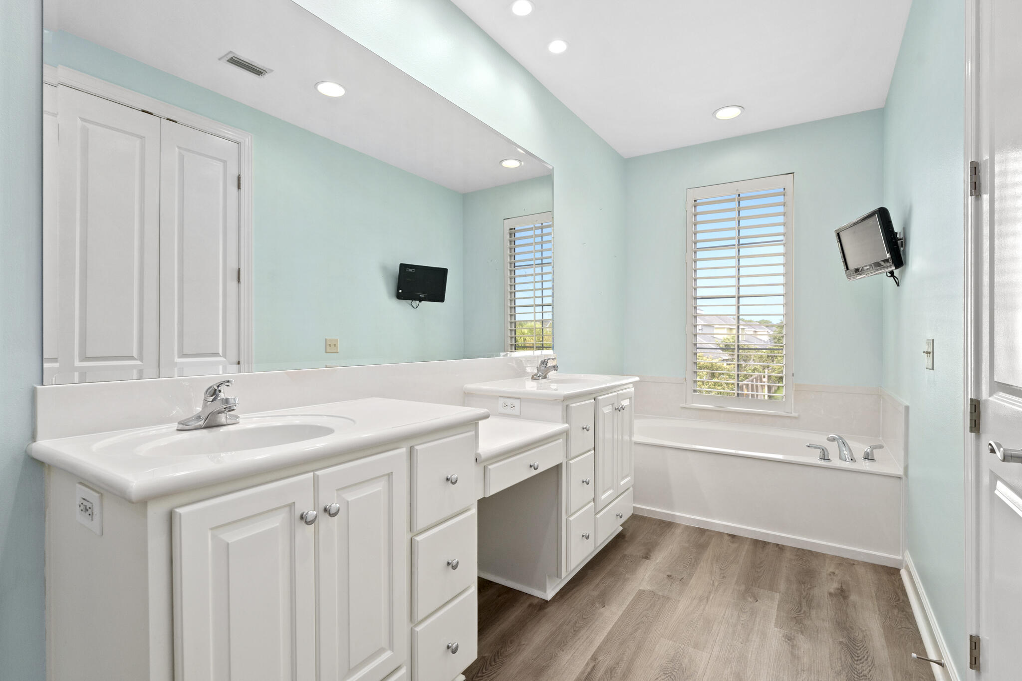 17 South Zander Way Santa Rosa Beach, FL 32459 - Photo 24 of 44 a bathroom with a sink double vanity granite tub shower and a mirror