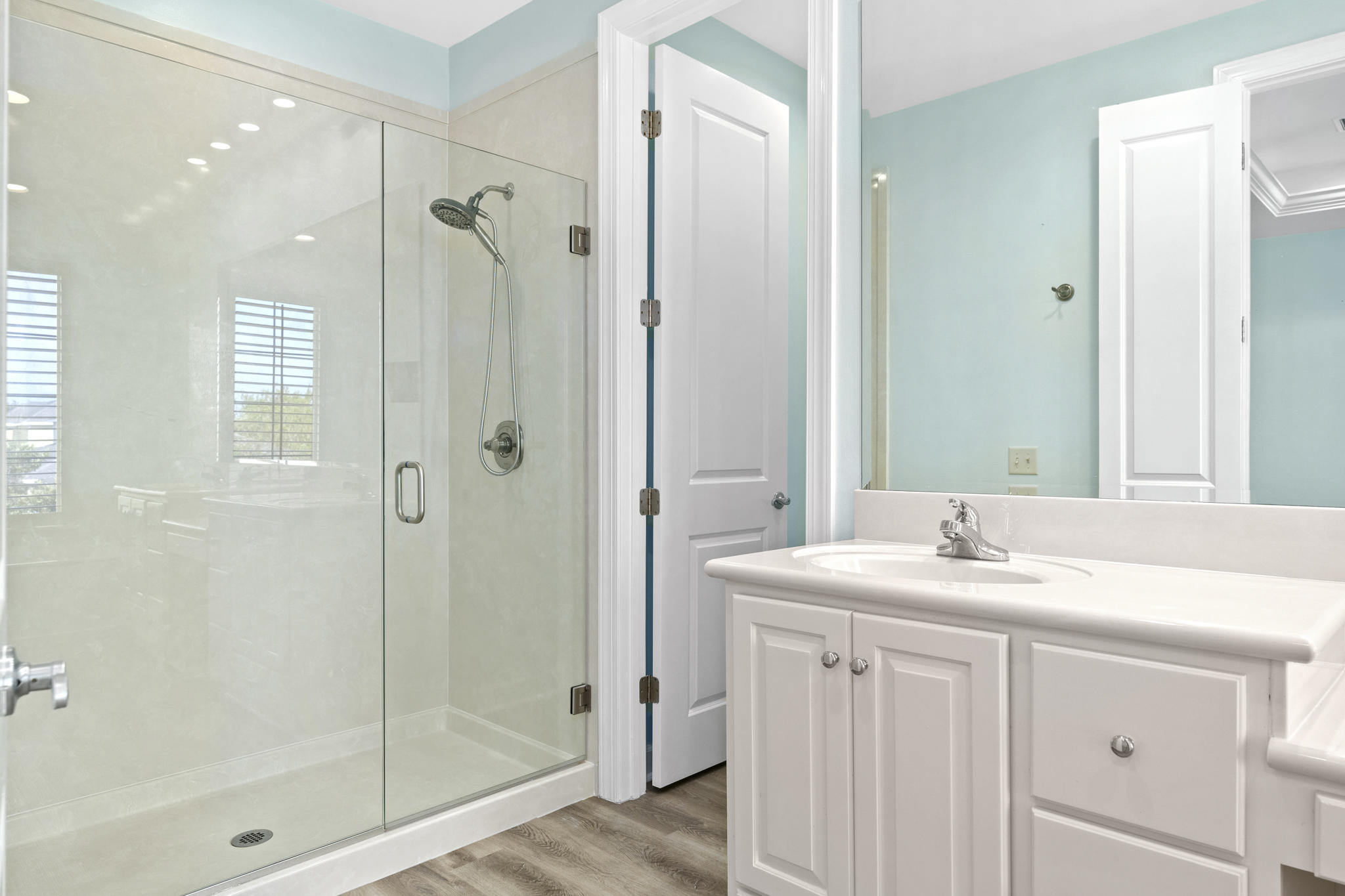 17 South Zander Way Santa Rosa Beach, FL 32459 - Photo 25 of 44 a bathroom with a shower sink vanity granite and shower