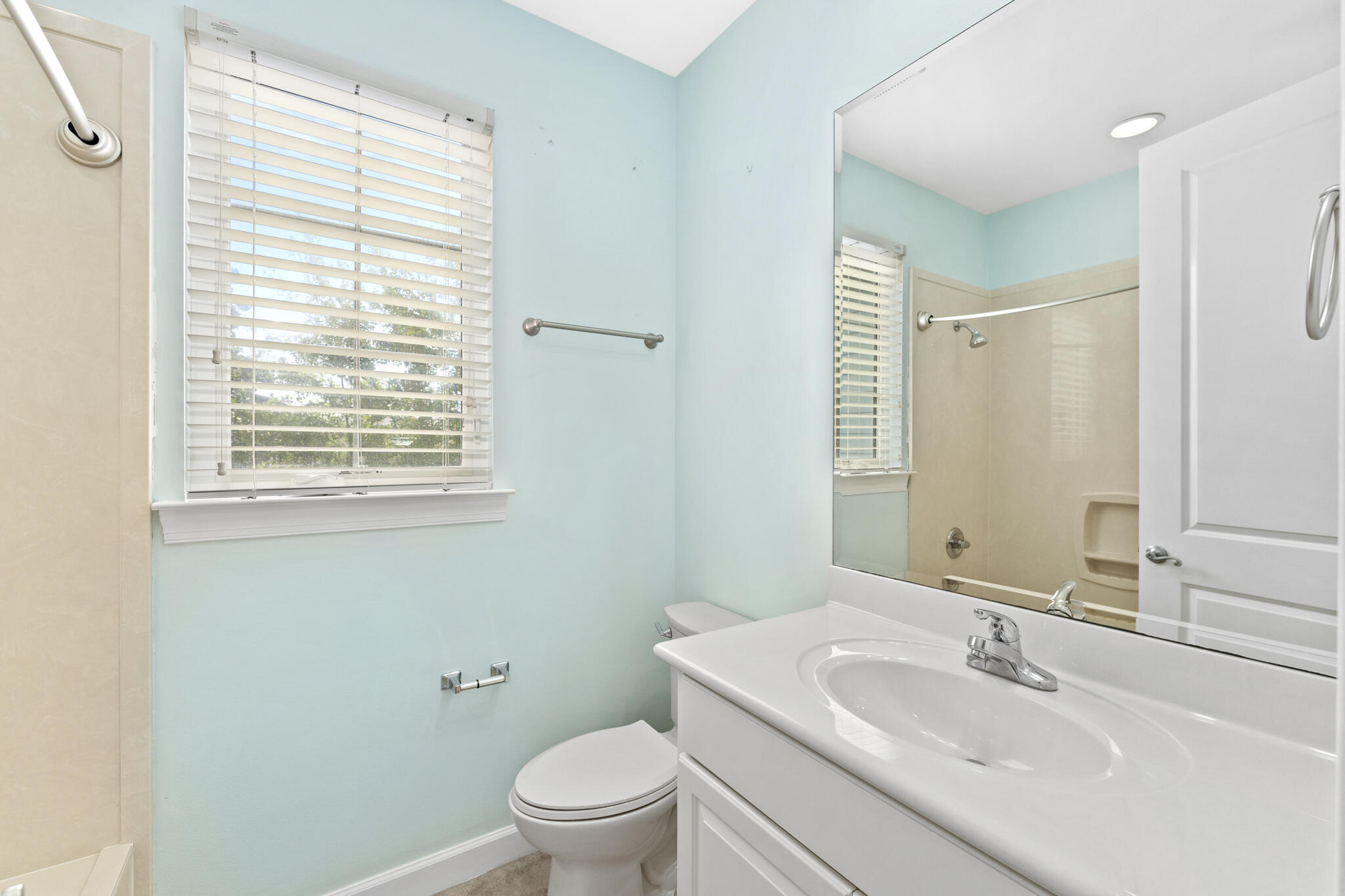 17 South Zander Way Santa Rosa Beach, FL 32459 - Photo 28 of 44 a bathroom with a sink a toilet and a window