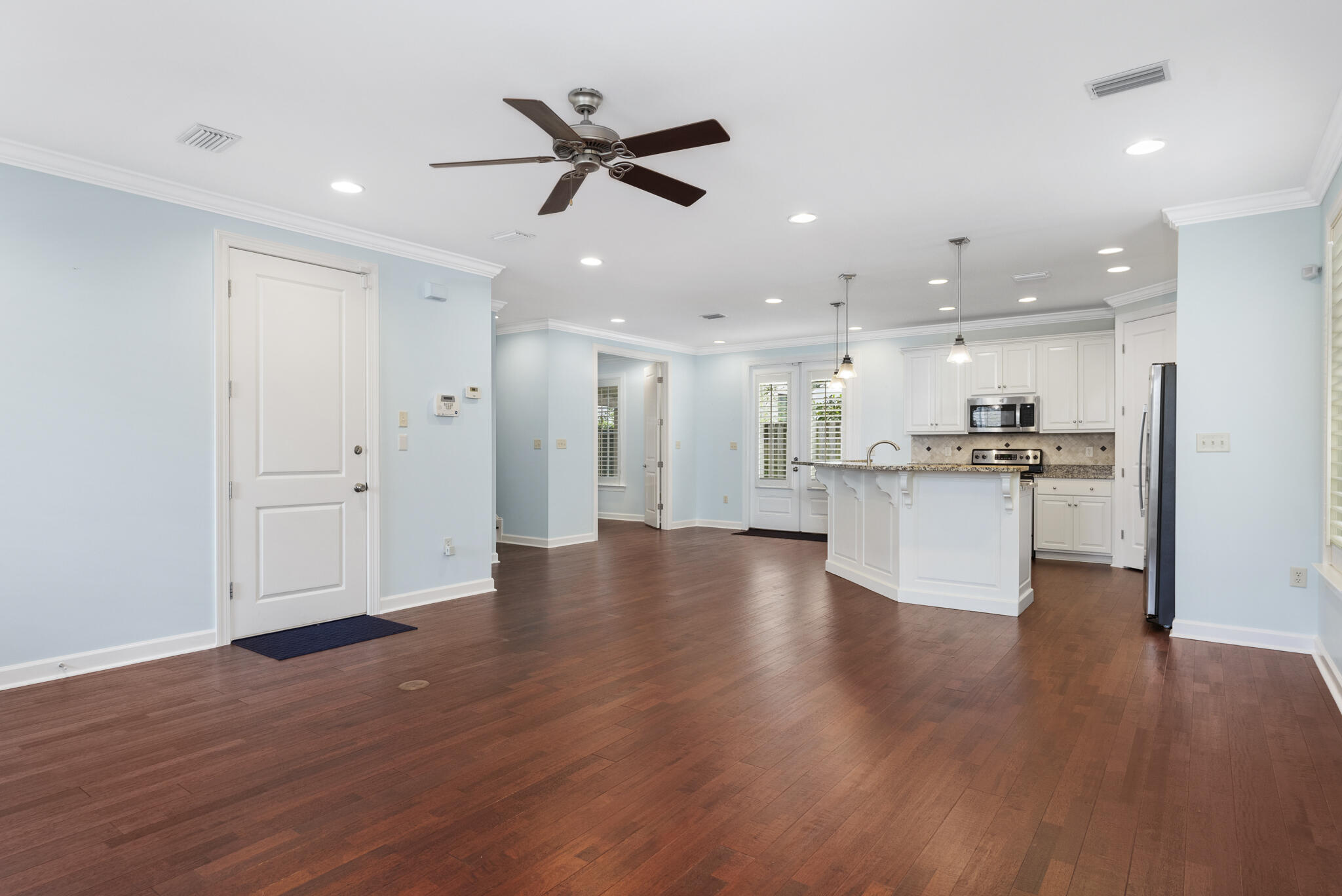 17 South Zander Way Santa Rosa Beach, FL 32459 - Photo 7 of 44 a view of kitchen with wooden floor and window