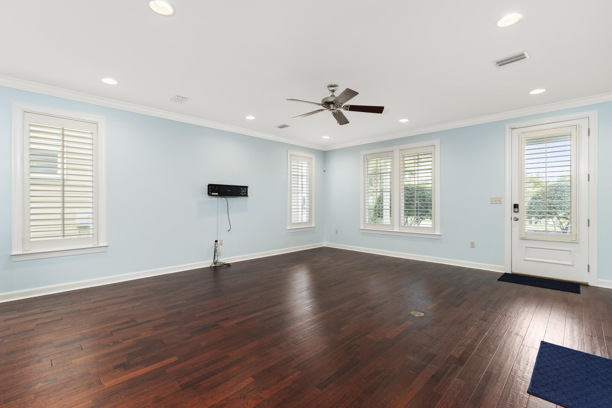 17 South Zander Way Santa Rosa Beach, FL 32459 - Photo 8 of 44 a view of an empty room with wooden floor and a window