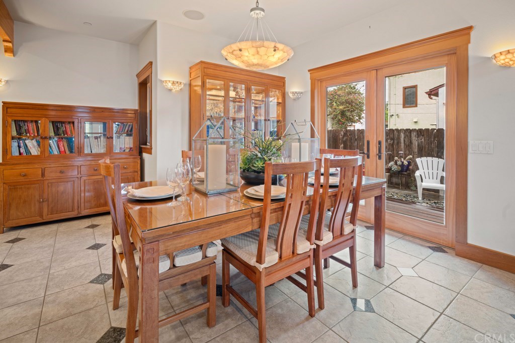 218 14th Street Seal Beach, CA 90740 - Photo 12 of 44 Dining room opens onto side deck and Patio with overhead lighting for relaxing and entertaining