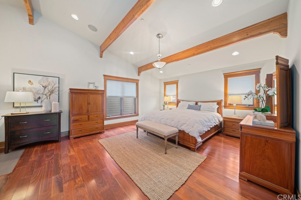 218 14th Street Seal Beach, CA 90740 - Photo 21 of 44 Spacious en-suite master Bedroom with beamed vaulted ceilings and mahogany floors