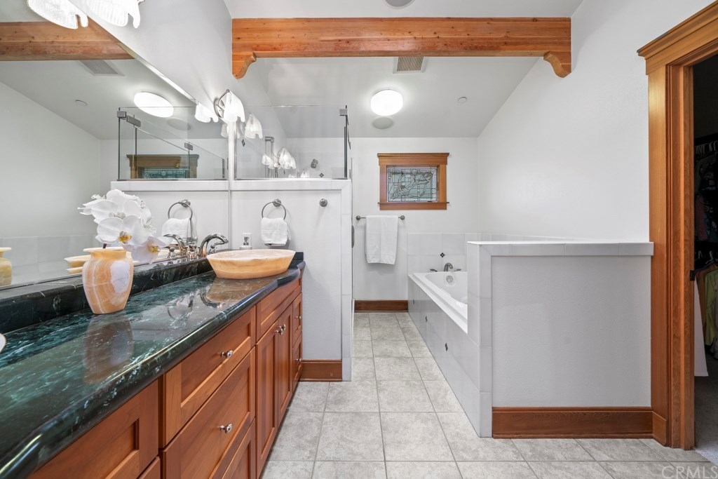 218 14th Street Seal Beach, CA 90740 - Photo 24 of 44 Master en-suite bathroom with walk in shower, jetted tub, skylight and large walk in closet