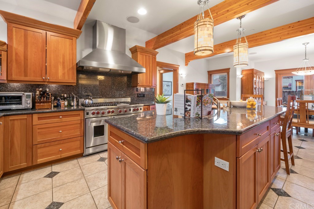 218 14th Street Seal Beach, CA 90740 - Photo 8 of 44 Kitchen with blue pearl Granite counter tops, Cherry wood Cabinets, Dry bar, 6 burner Wolf 48"range with double ovens.