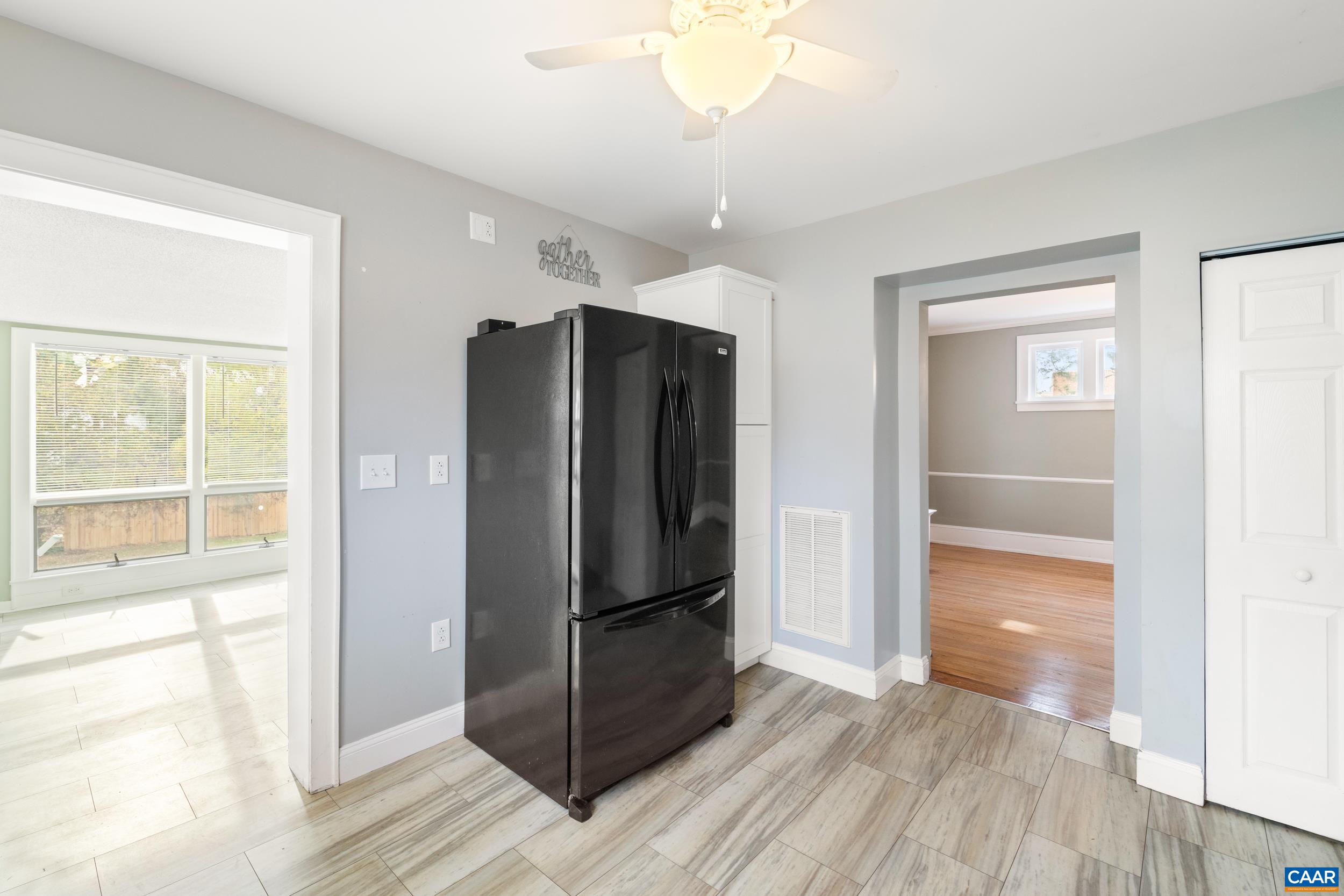 21 Port Republic Road Harrisonburg, VA 22801 - Photo 13 of 69 a view of a refrigerator in kitchen and wooden floor