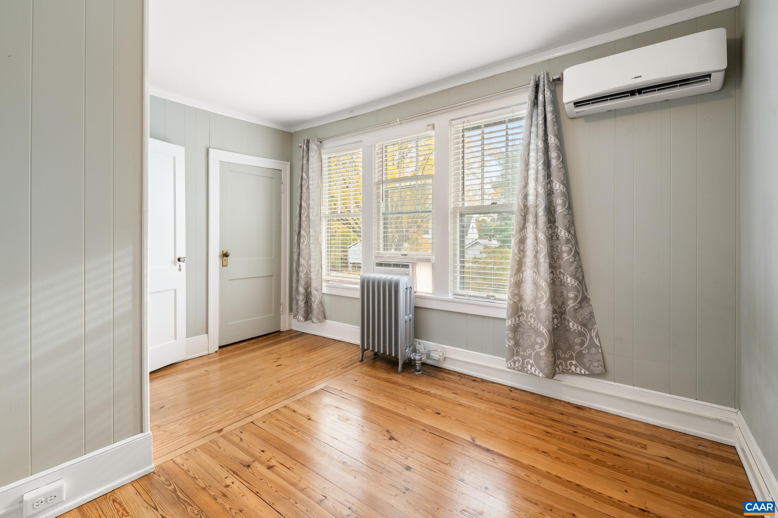 21 Port Republic Road Harrisonburg, VA 22801 - Photo 32 of 69 a view of empty room with wooden floor and fan