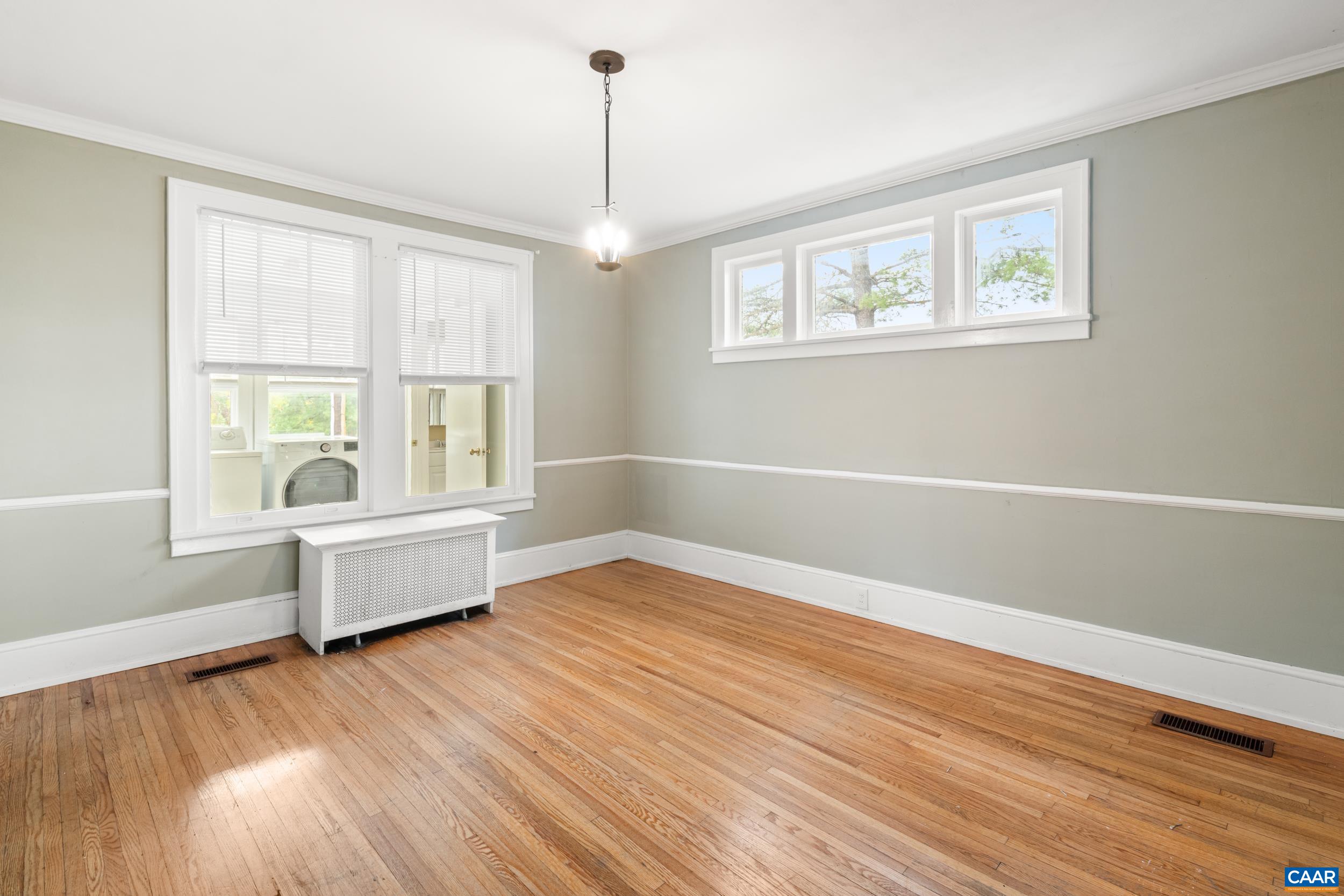 21 Port Republic Road Harrisonburg, VA 22801 - Photo 8 of 69 a view of a big room with wooden floor and windows