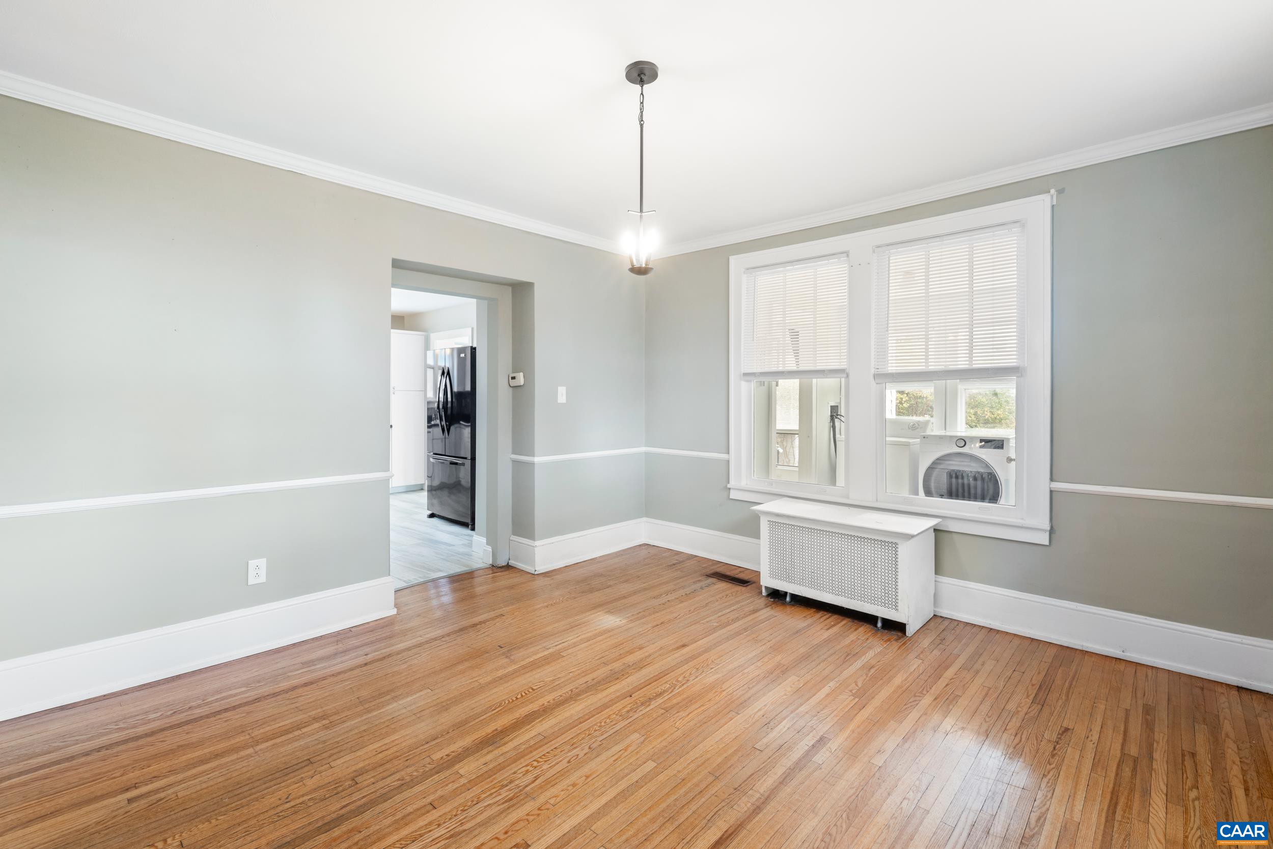 21 Port Republic Road Harrisonburg, VA 22801 - Photo 9 of 69 an empty room with wooden floor and windows